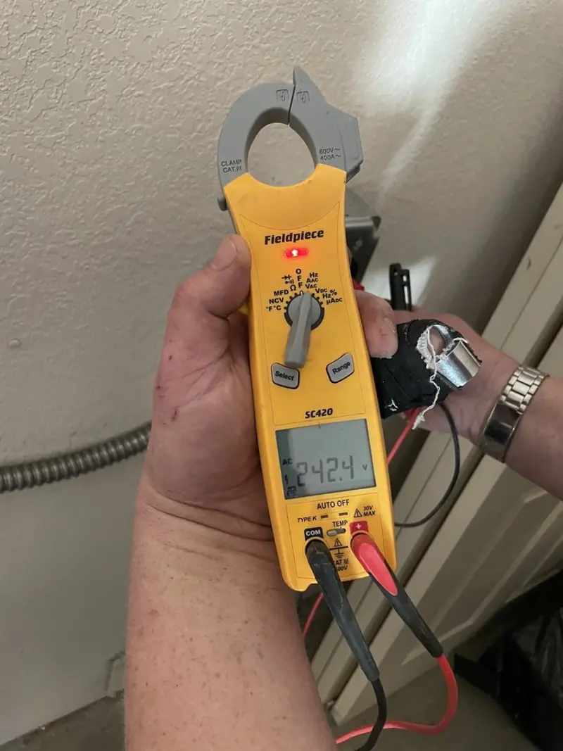 Voltage testing with clamp meter during Generator Installation in Canton